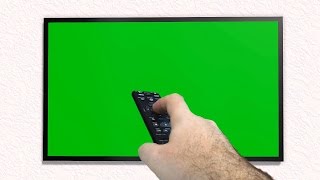 Tv With Green Screen Is Switched On With Remote Control - Free Use