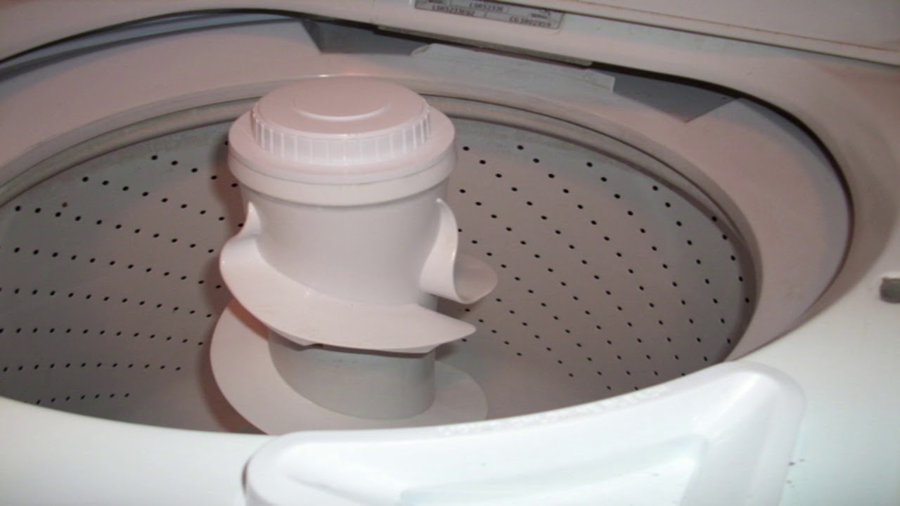 Washing machine agitator dildo