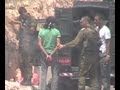Visual: Blindfolded Palestinian shot by soldier with rubber bullet
