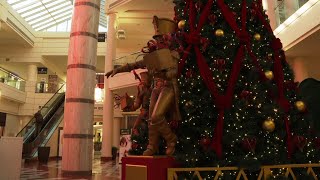 Virus keeps Black Friday crowds thin across the US