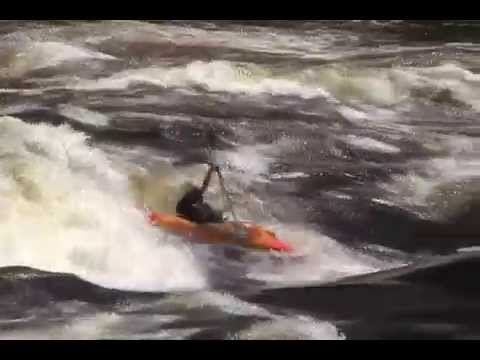 Eric Jackson, Dane Jackson, and Stephen Wright freestyle kayaking on the 