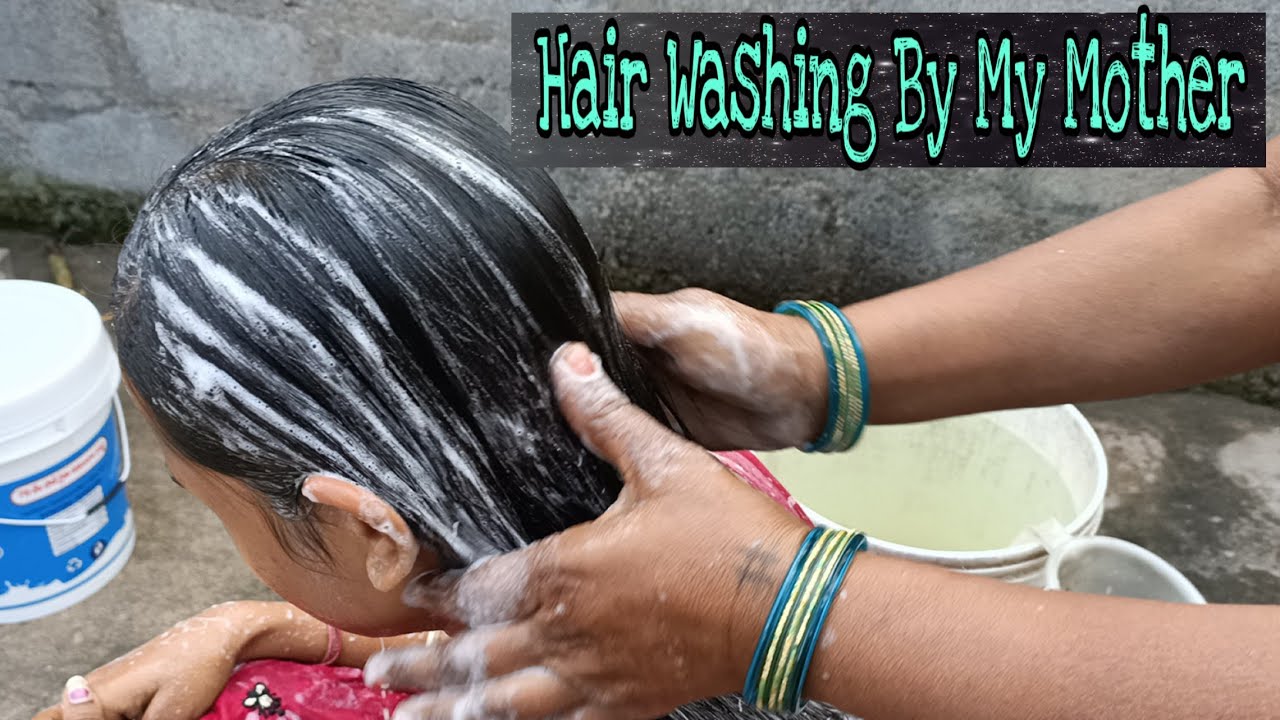 Washing hair outside slow motion pic