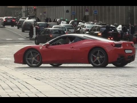  loud red Ferrari 458 italia with black roof and darkened stock rims