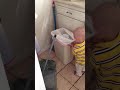 22 month old Davis yang lining the trash can