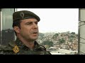 Brazil struggles to secure slums