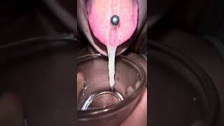 Lila long dirty tongue piercing hocking and spitting loogies showing mouth throa