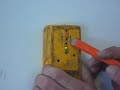 How to use a stud finder to locate a stud.