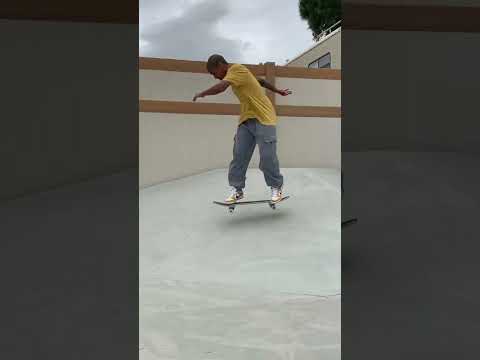 Yosef Ratleff half cab flip in the yard.