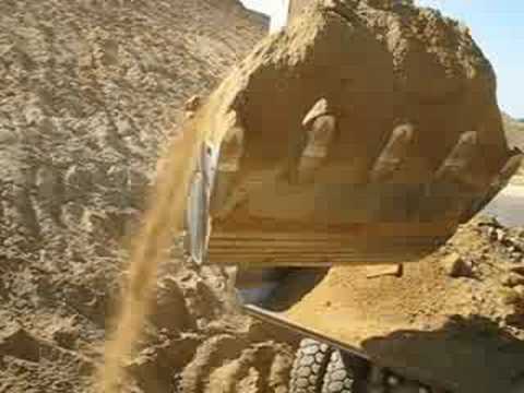 Watch Liebherr 974B and Caterpillar 769D from cab