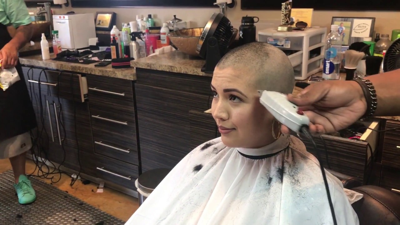 Getting her head shaved