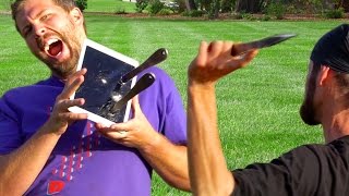 How Far Away Can World Champion Knife Thrower Hit iPad Pro 9.7"? - Gizmoslip