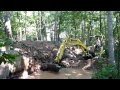 Mini Excavator Digging Sand
