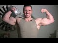 Big Arms Posing and Flexing Muscle Flexing Biceps with Bodybuilder and Trainer Victor Costa