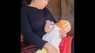Single Mom Breastfeeding Her Cute Baby.