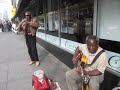 Leviticus Gory sax and Robert Conton guitar -Street Music on 6th Ave. NYC