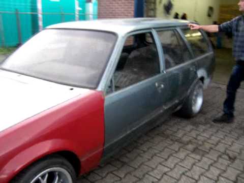 Opel Rekord E2 caravan 23 Diesel 1985 met Opel Senator A2 neusdeel 1