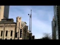 Flag Runners: Flagpole next to historic Water Tower gold coast Chicago