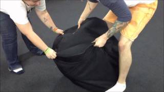 Girl Trapped In Drum Bag