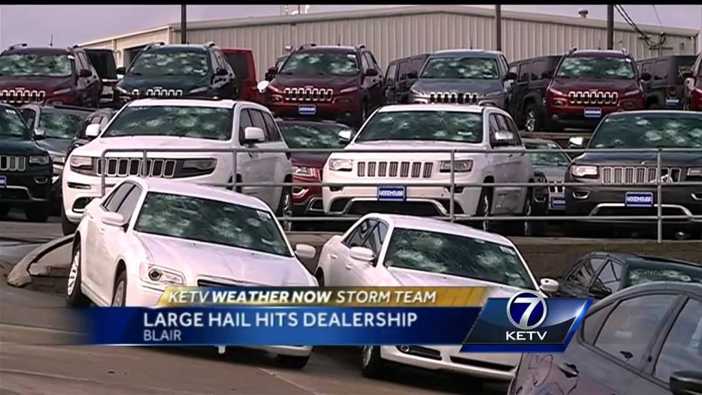 Woodhouse vehicles nailed by hail storm - YouTube
