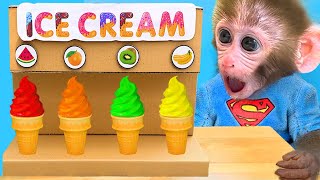 Monkey Baby Bon Bon doing shopping in Toy store and eats ice cream rainbow with 