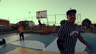 Break Dancers Dancing At Basketball Court