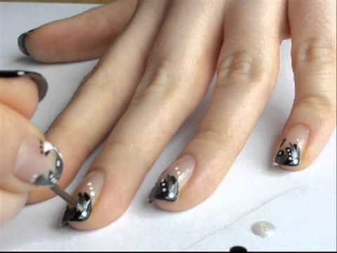 Nail art design using lack, grey, silver and white which reminds me of black and white nail art designs. Nail art design using lack, grey, silver and white which reminds me of