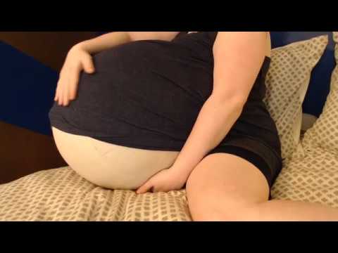 Camgirl pregnant belly movements