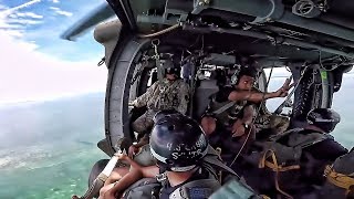 Parachute Jump Into Water From Black Hawk Helicopter Parachute Jump Into Water From Black Hawk Helicopter