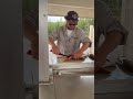We chartered a Fishing Boat in Lake Yellowstone....here is our Awesome Captain, Conner cleaning fish
