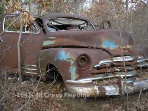 Abandoned rusty classic cars and trucks located in central Virginia USA