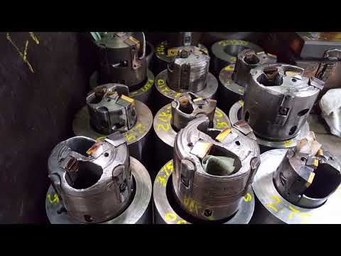 Working on different machines.  Big holes long steel bar