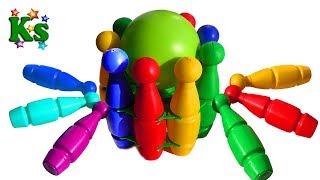 Kids Learning Colors By Playing A Toy Bowling