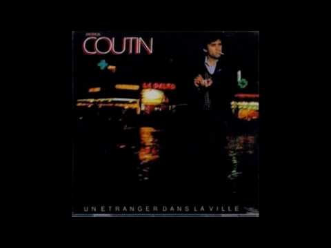 Un Etranger Dans La Ville Video