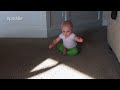 Adorable baby is startled by shadow