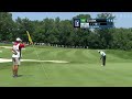Tim Clark rolls in a 40-foot birdie bomb at John Deere
