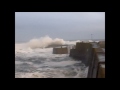 St Abbs Harbour, Scotland, being pounded by big waves and High Tide. 19th January 2014