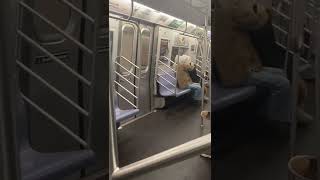 Couple Kiss In Metro