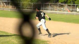 Kinder High school baseball player Brandon Norris batting