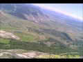 Falcon wearing POV camera flying high over Jackson Hole Wyoming