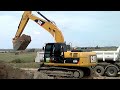 EXCAVADORA CAT