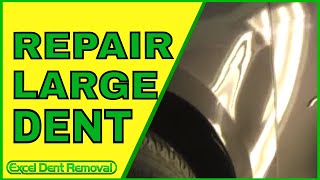 Repaired a Large Dent in this Car Fender