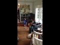 Christopher whistling and dancing with David Walburn