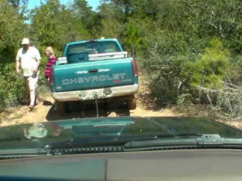 4RUNNER Pulling Chevy Truck out of Mud Hole