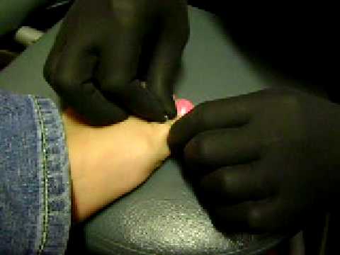 toe piercing by illy joe Rock Billy Tattoo. toe piercing by illy joe