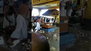 Guruvayur Temple Coconut Breaking On Stone