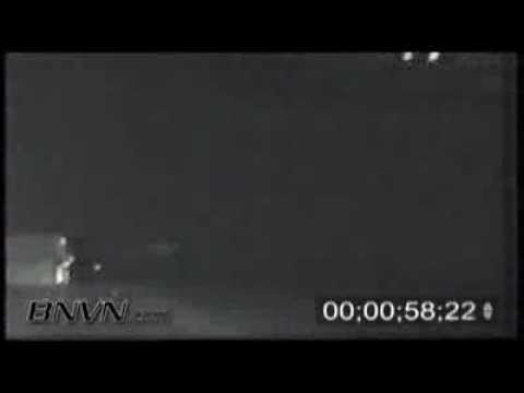 3/9/1998 POV camera footage of a semi truck blown over on its side during and overnight tornado