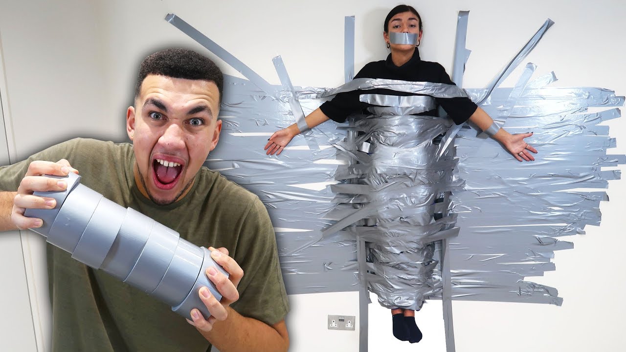 Guy wraps girlfriend duct tape