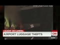 Hidden cam shows baggage handlers stealing from luggage