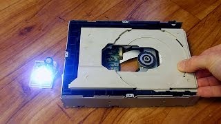 Build Hand-Powered LED Flashlight from CD or DVD drive