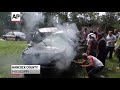 Raw Video: Sisters Rescued From Burning Car